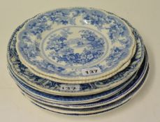 An assortment of nine English 19th century blue and white printed pottery plates including Spode and