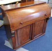 A Victorian mahogany cylinder desk 107cm wide.