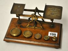 Victorian set of brass postal scales and weights.