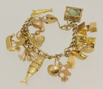 9ct gold charm bracelet approximately 49g.