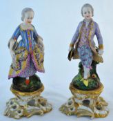 19th century porcelain figures, possibly French `The Gallant and Lady` in period costume, 26cm tall.