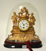 A French gilt spelter mantle clock under glass dome with key and pendulum, 34cm high.
