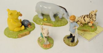 Five Doulton Winnie The Pooh Collectables , WP27, WP26, WP9, WP28, W25 (four with certificates).