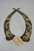 Pair of large 20th century carved horn sculptures with dragon decoration, approx 49cm t/w pair small
