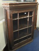 19th century carved oak and glazed hanging corner cupboard.