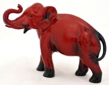Royal Doulton Flambé Elephant 16.5cm high x 23cm long, signed on foot by FM for Fred Moore.