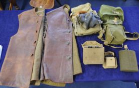 A collection of WWII Militaria including two respirators including anti gas goggles, small resp bag,
