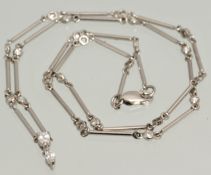 A fine 18ct white gold necklace set with diamonds, approximately 38cm long, stamped 750
