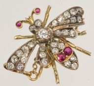 Small bee brooch set with old cut diamonds and rubies in yellow gold approximately 30mm x 22mm
