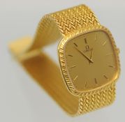 Gents 18ct yellow gold TV shaped Omega quartz wristwatch, with champagne baton dial with rope design