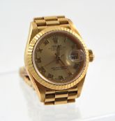 Ladies 18ct gold Rolex Oyster Date wrist watch with original box and papers, also outer box, wallet,