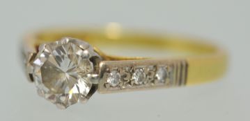 18ct gold diamond solitaire ring, the single modern brilliant cut diamond approximately .75 ct, with