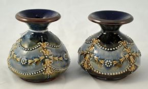 A pair of small Doulton Art pottery vases, various impressed marks, 8cm