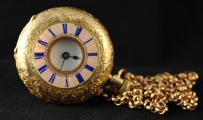 An antique Ladies gold fob watch, stamped 18k, the half hunter case with enamelled and iridescent