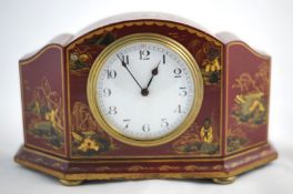 A red lacquer cased mantle clock with 8 day drum movement with platform escapement, circa 1949