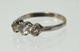 Three stone diamond ring set in 18ct white gold