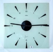A modern Alma glass wall clock of Deco design, 50cm x 50cm