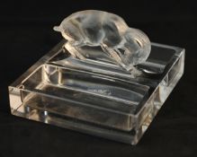 Lalique moulded clear and frosted glass desk stand surmounted with a goat, 13cm wide, printed