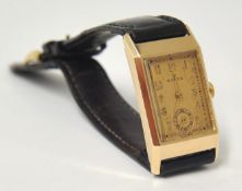 A 1930/40`s gold Rolex wrist watch, the rectangular case with gold dial and sub second dial, the