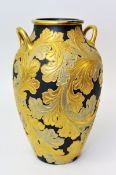 A Wedgwood black Basalt and gilt decorated large handled vase, 42cm tall