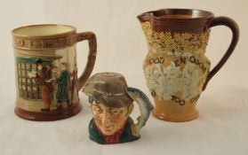 Royal Doulton tankard `Oliver Twist` t/w Doulton stoneware wine jug with embossed decoration and