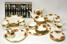 Royal Albert `Old Country Roses` tea service, approximately 60 pieces and a similar cutlery set