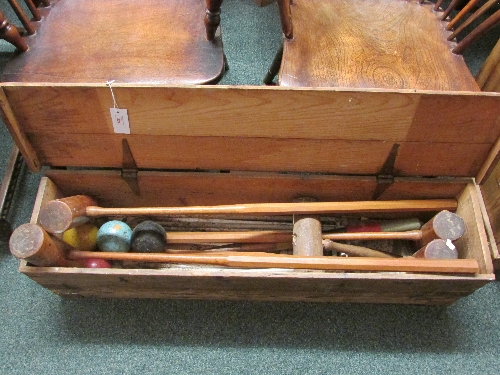 A croquet set contained within a pine box stenciled JAQUES LONDON, including four balls and mallets,