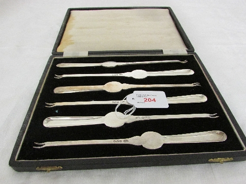 Boxed set of six lobster picks, marks for Sheffield 1954, maker`s stamp HA for Atkin Brothers, (6.