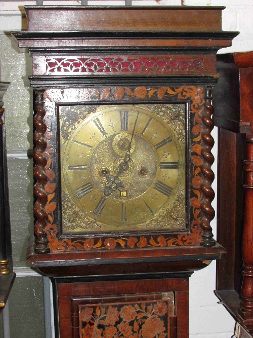 A William & Mary eight day striking long case clock by William Bennett of London, the square brass