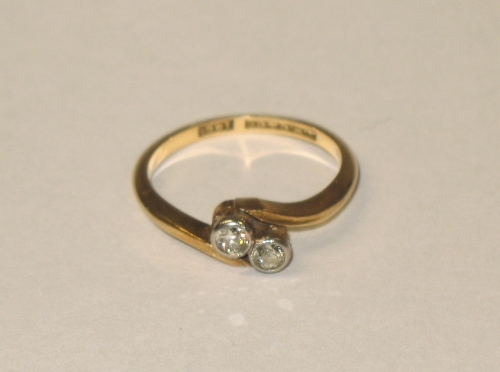 18ct gold twist two diamond engagement ring