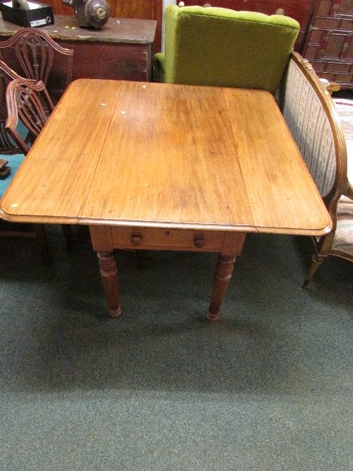 Victorian mahogany Pembroke table with single drawer supported on baluster legs with castors
