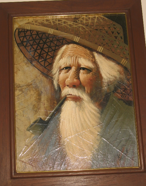 Portrait of old man in bamboo hat smoking pipe, painted in oils on a canvas of pressed leaves (