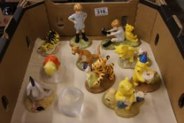 A collection of Royal Doulton Winnie the Pooh figures, comprising off Christopher Robin and Pohh