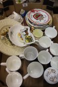 A collection of various pottery to include collectors plates, commemorative mugs etc