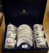 A Royal Worcester boxed coffee set boxed in botanical flowers design