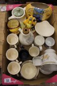 A collection of various pottery to include a Dudson part tea set, a German signed art vase, figures,