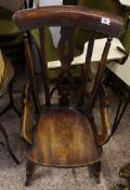 19th Century Rocking chair with unusually low arms.