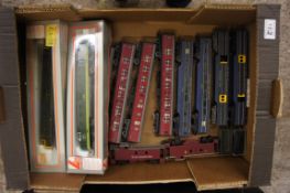 A collection of Lema and Tri ang railway engines and carriages some boxed. 15 in total