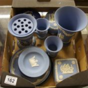 A selection of various shades of blue Jasperware to include small dishes, a vase, 3 trinket boxes