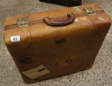 A large heavy 1940's suitcase made by Norris