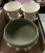 A collection of Wedgwood green jasperware large footed bowl and 2 white Wedgwood vases.