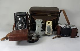 Rolleiflex camera Carl Zeiss jena lenses and additional lenses cased with accessories