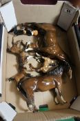 A collection of Damaged Beswick horses and damaged Royal Doulton Figure David Copperfield