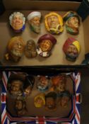 A collection of vintage Bosson wall plaques. 16 in total. 2 Trays