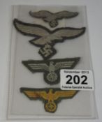 4 German Cloth uniform badges.