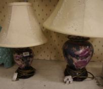 Two China Floral Lamps with Shades decorated with Pink Flowers on a Blue Background, height 50cm and