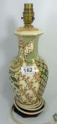 A Masons pottery lamp base in the Applique design on wood base, height of pottery 29cm