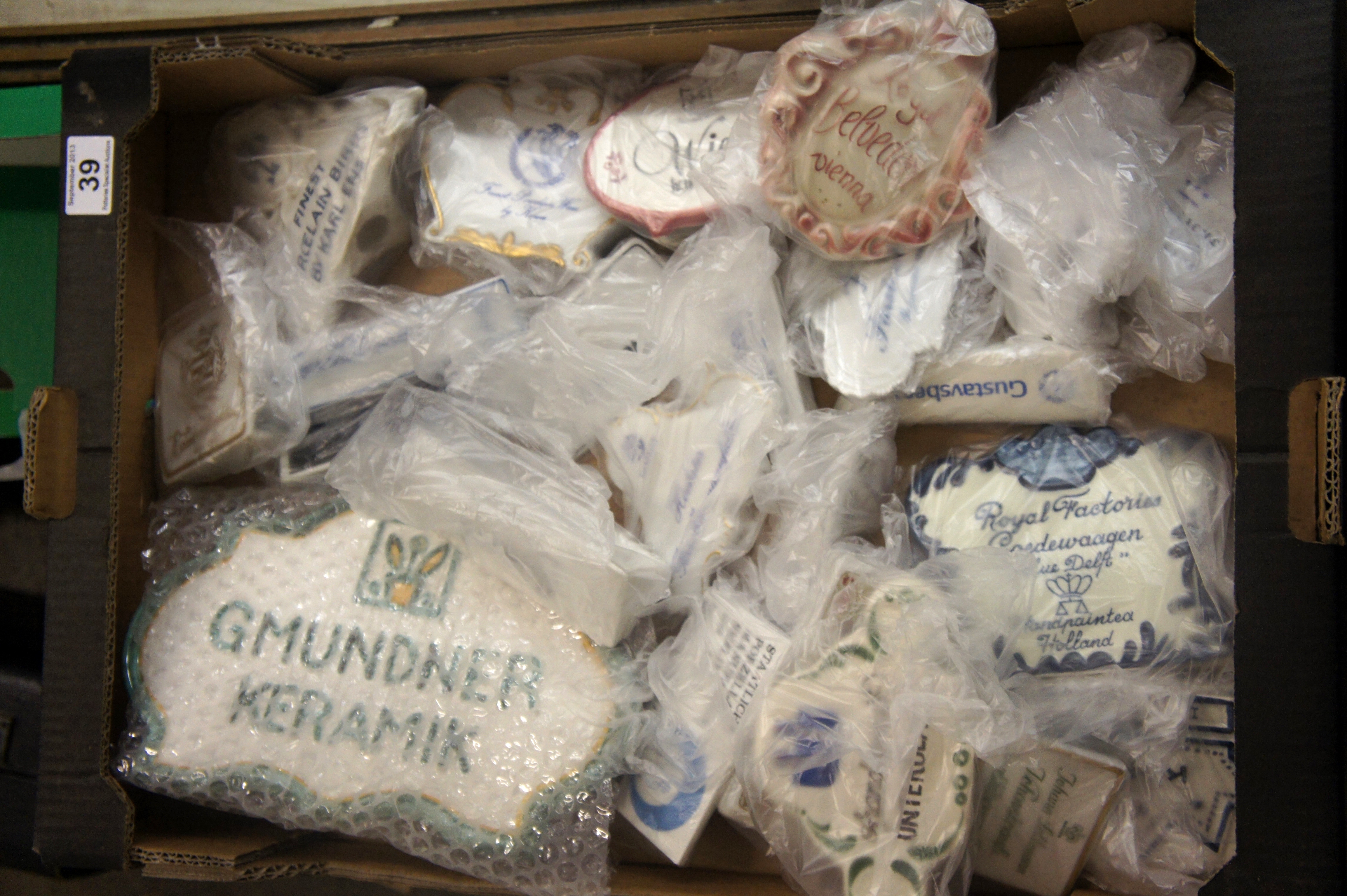 A collection of Mixed European pottery manufacturers Name Plaques (approx 25)