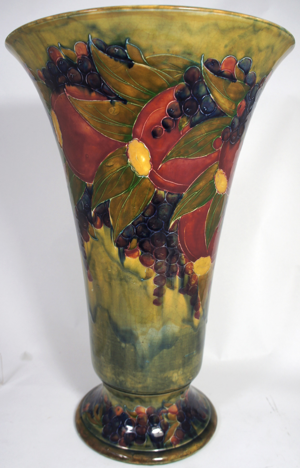 Moorcroft Large Vase decorated in the ochre Pomegranate design, signed William Moorcroft, height