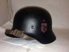 WW2 M35 German Helmet with Leather Lining and Chin Strap (possibly post war repainted)